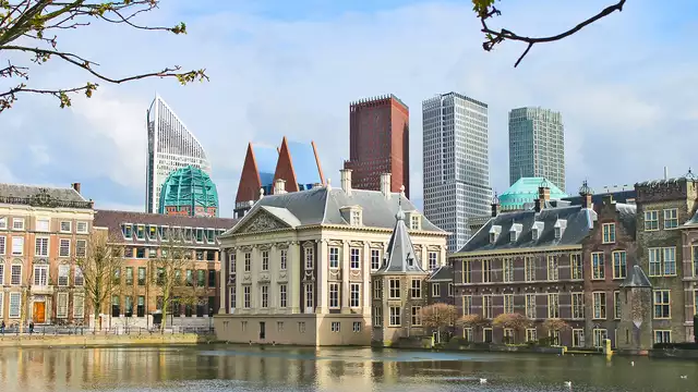 Een suite met uitzicht in een park naast Delft