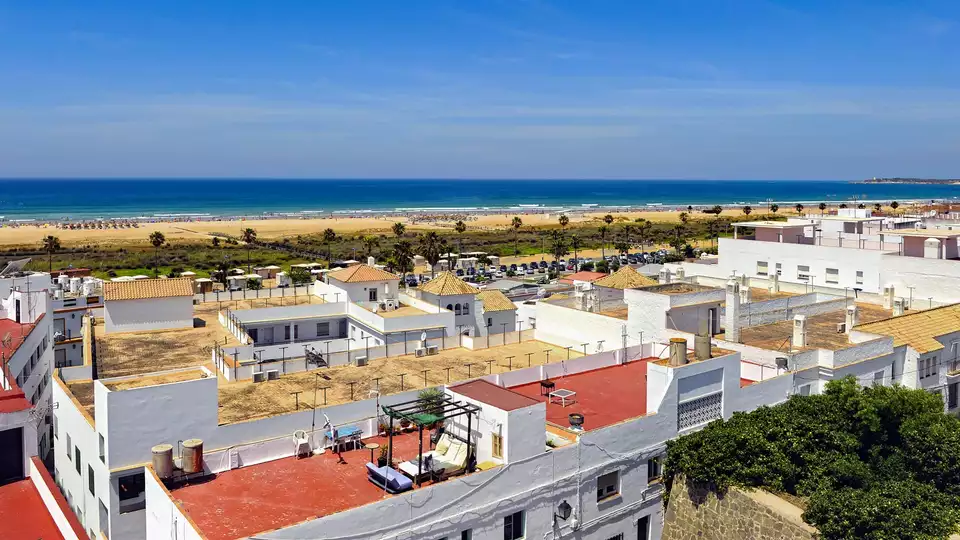 Toosten met cava aan het strand van Conil de la Frontera