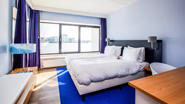 Design en comfort met een prachtig uitzicht over de Maas nabij Rotterdam