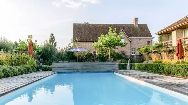 Overnachting in een 'Heritage' kamer met zicht op de tuin en openluchtzwembad