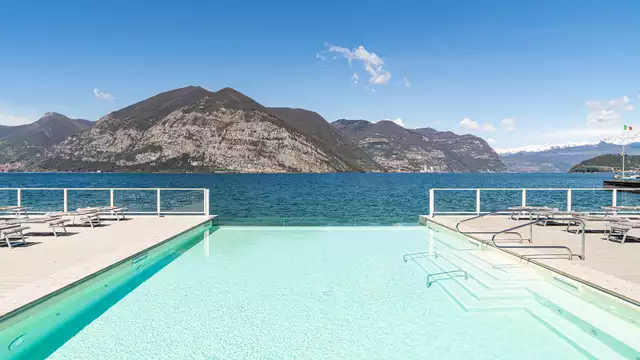 Vakantie aan het Iseomeer in een unieke omgeving en kamer met uitzicht op het meer