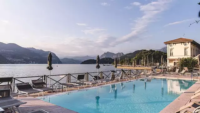Vakantie aan het Iseomeer in een unieke omgeving en kamer met uitzicht op het meer