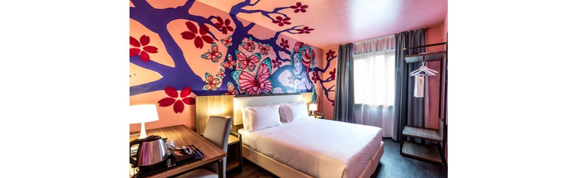 Vacances à la périphérie de Vérone dans un hôtel d'art en chambre triple