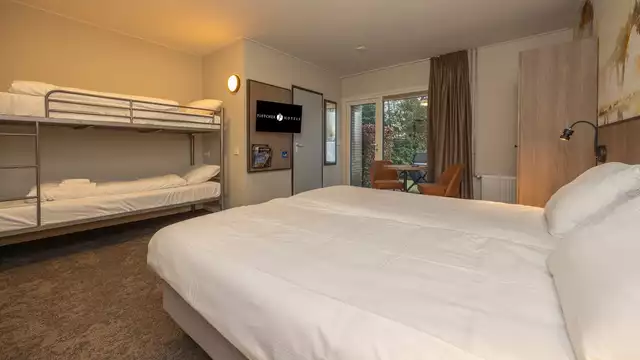 Familieplezier in een comfortabele kamer op de Veluwe