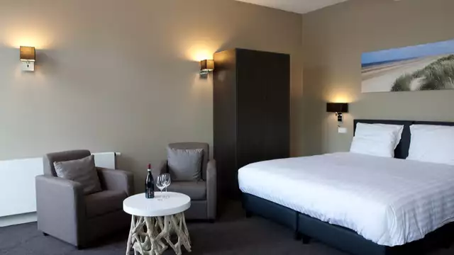 Vacanza sulle spiagge sabbiose di Ouddorp da una suite