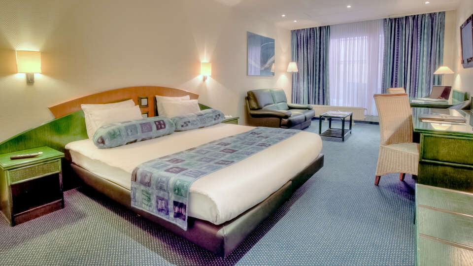 Romantiek in Bergen met spa cava en verblijf in een Deluxe kamer met terras