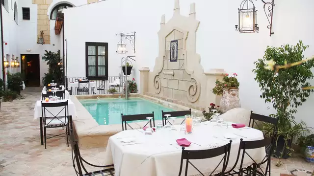 Escapada Romántica en habitación superior en el centro histórico de Osuna